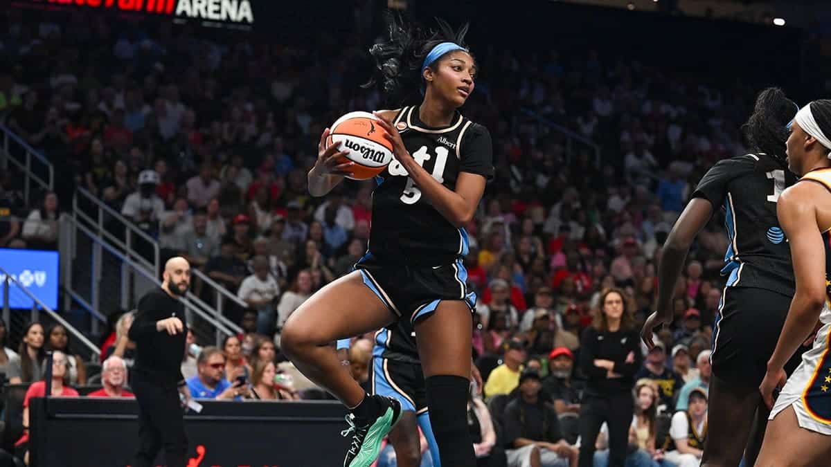 Angel Reese grabs a rebound during a WNBA game in Atlanta.