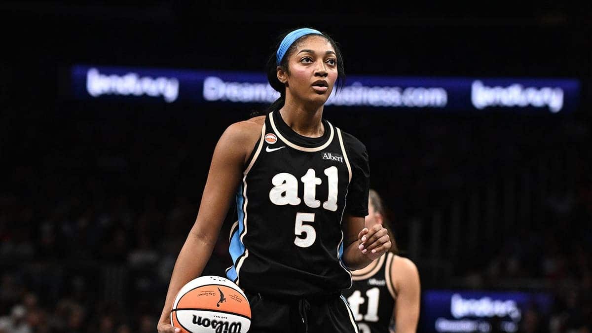 Angel Reese #5 prepares to shoot a free throw against the Indiana Fever.