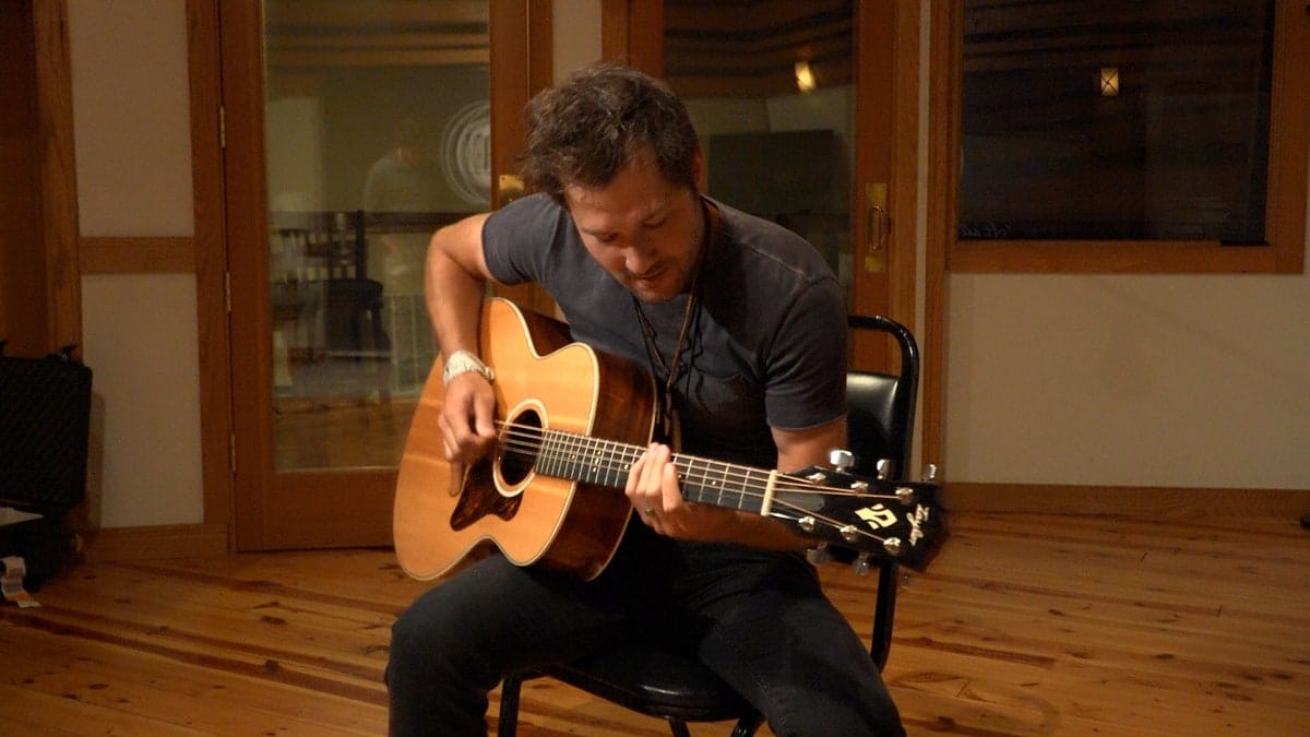 Ben Gallaher playing guitar