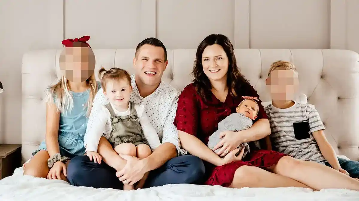 A family portrait of Jared and Kirsten Bridegan.