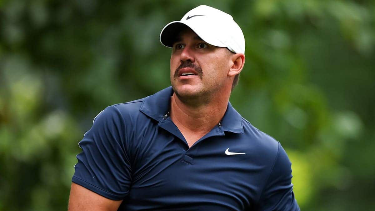 Brooks Koepka swings on the fourth tee during the Pro Am at Sedgefield Country Club.
