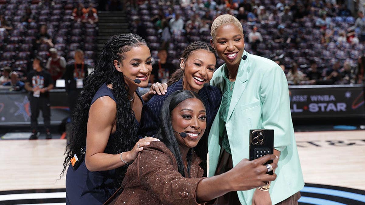 Chiney Ogwumike, Andrea Carter, Malika Andrews and Monica McNutt take a selfie before the WNBA All-Star game.
