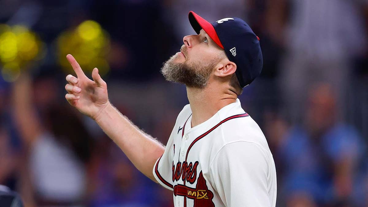 Chris Sale reacts after the Braves defeated the Dodgers