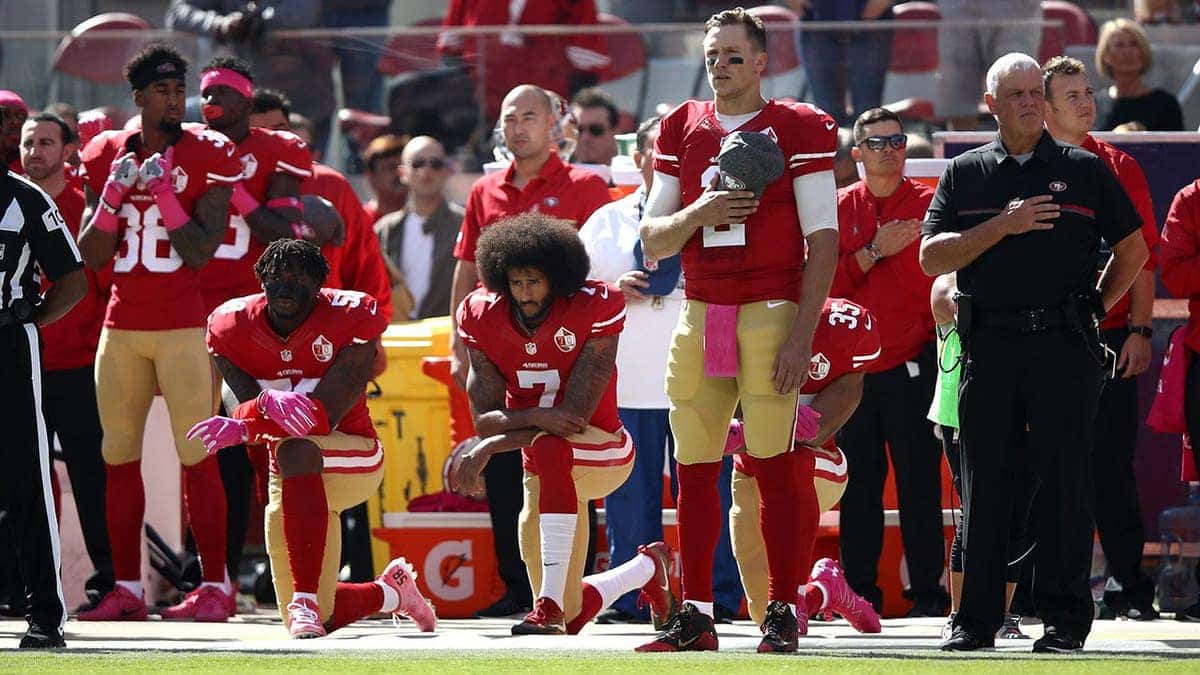 Colin Kaepernick kneels for the national anthem before a game at Levi's Stadium.