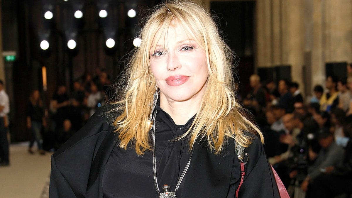 Courtney Love attends a fashion show in Paris.