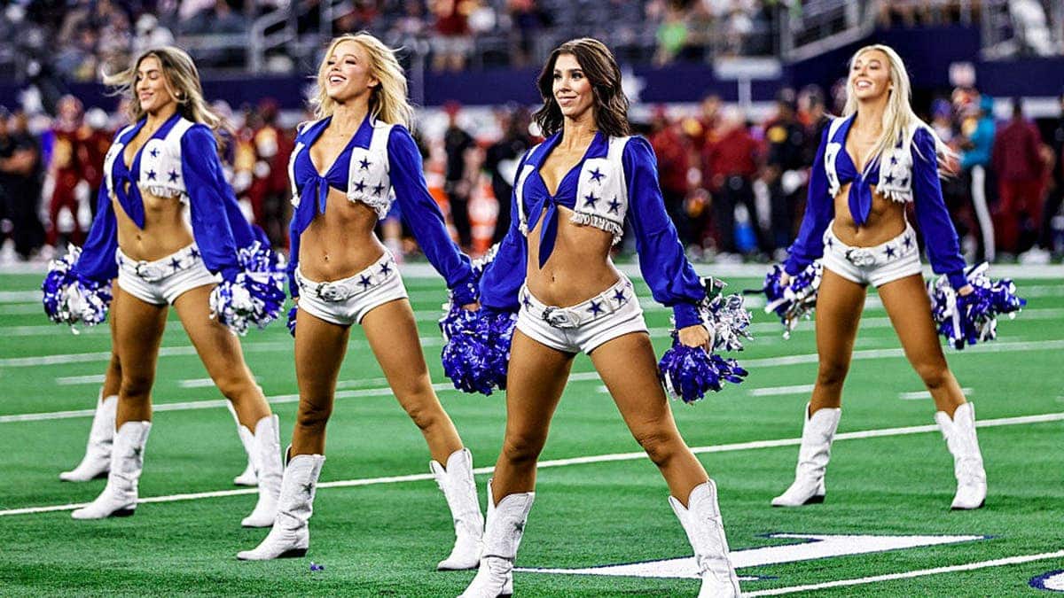 Dallas Cowboys Cheerleaders performing on field at AT&T Stadium in Arlington, Texas