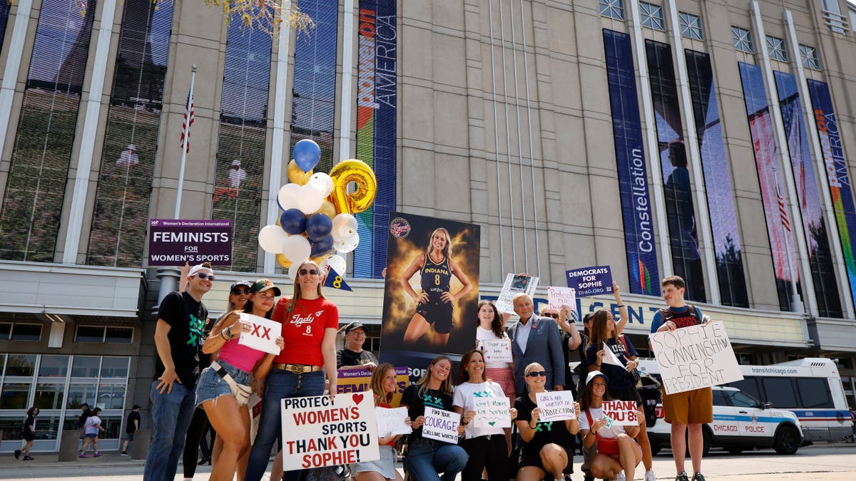 Demonstrators protest outside the United Center in Chicago.