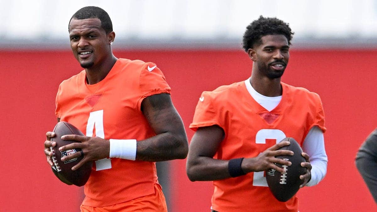 Deshaun Watson and Shedeur Sanders run a drill during Browns minicamp.