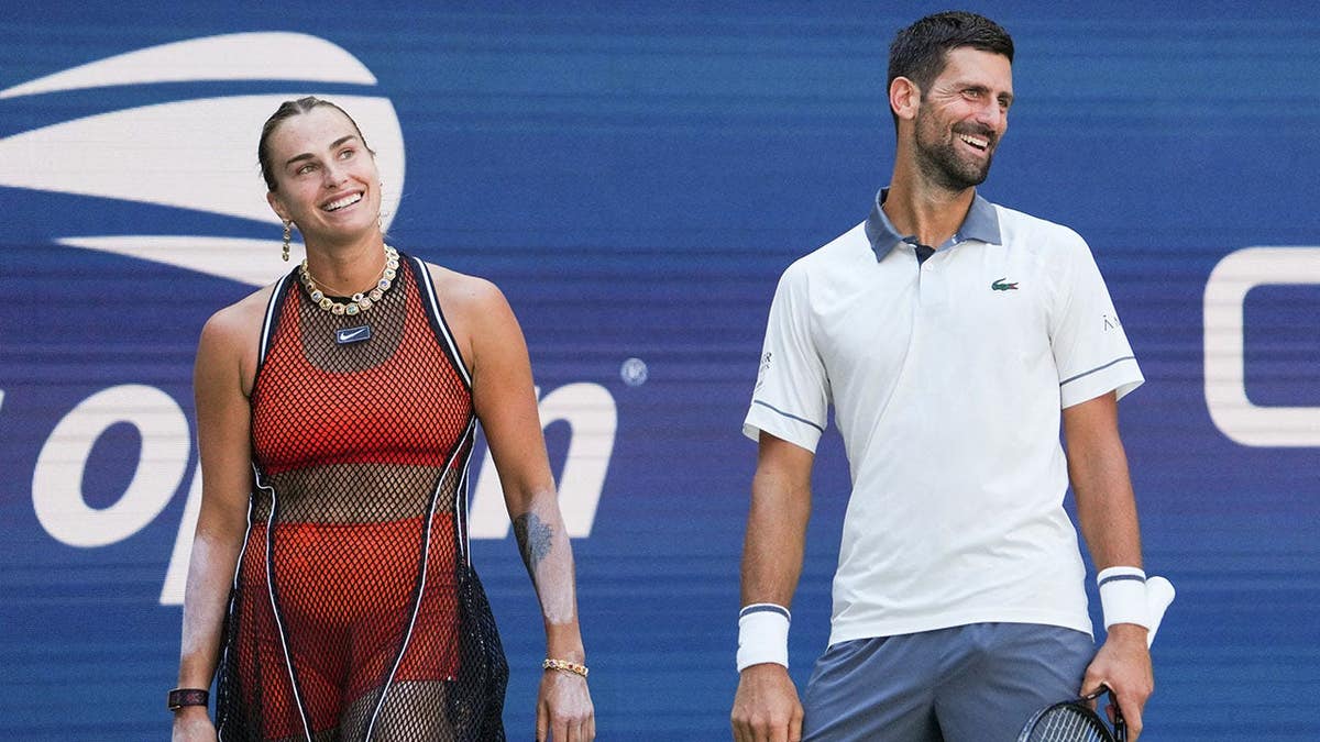 Novak Djokovic and Aryna Sabalenka react during a mixed doubles tennis match at the US Open.