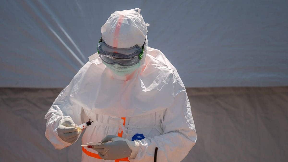 Health worker prepares a blood sample at Bunia General Hospital in Bunia, Congo.