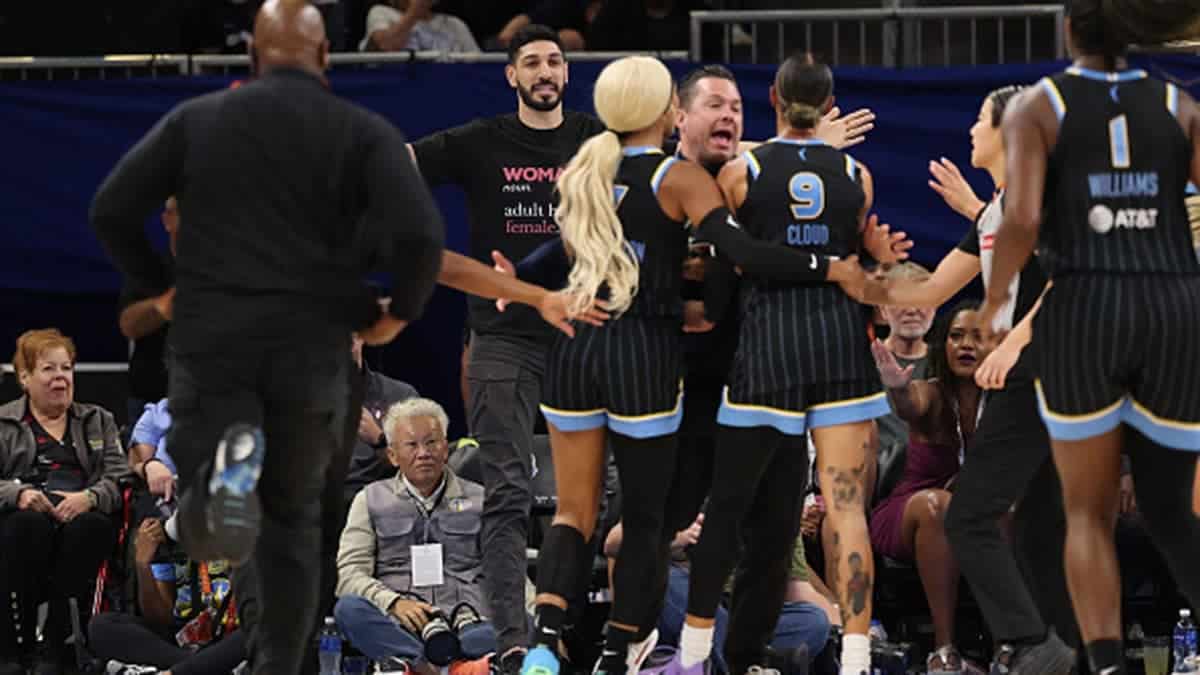Enes Kanter Freedom and Natasha Cloud yell at one another during a Chicago Sky basketball game.