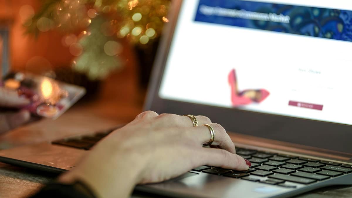 A woman typing on her computer