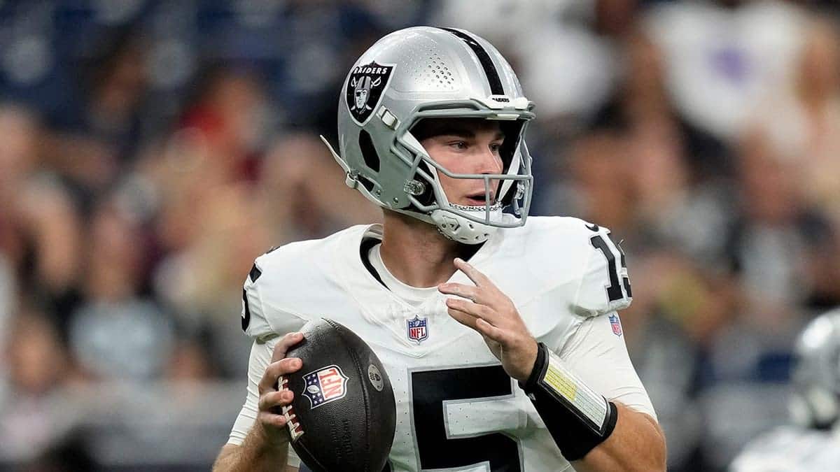 Fernando Mendoza, Las Vegas Raiders quarterback, looks to throw against the Houston Texans.
