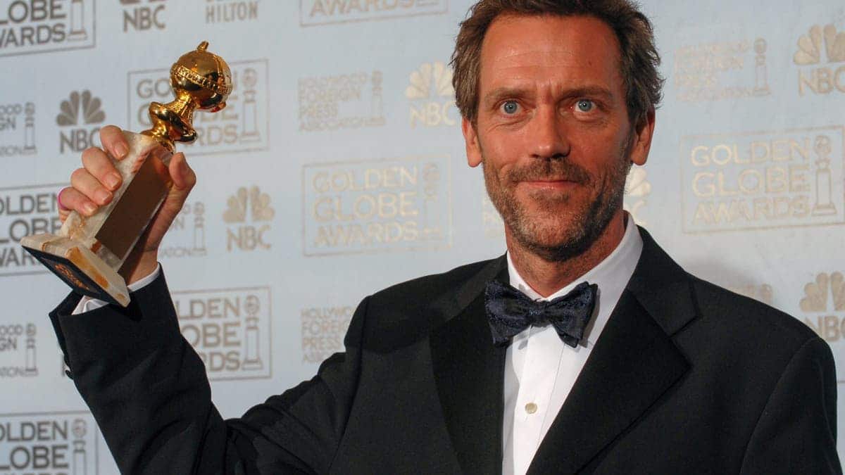 Actor Hugh Laurie standing backstage at the 64th Annual Golden Globe Awards.