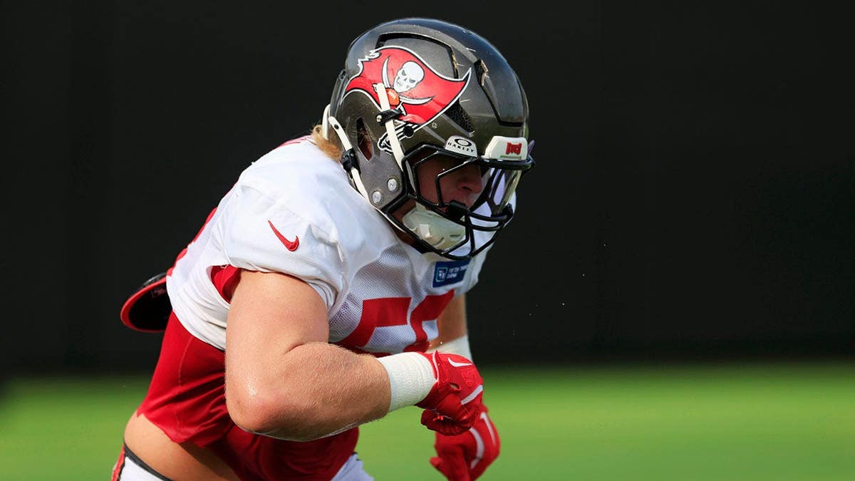 Jack Pyburn runs a drill during Buccaneers-Jaguars practice in Jacksonville.
