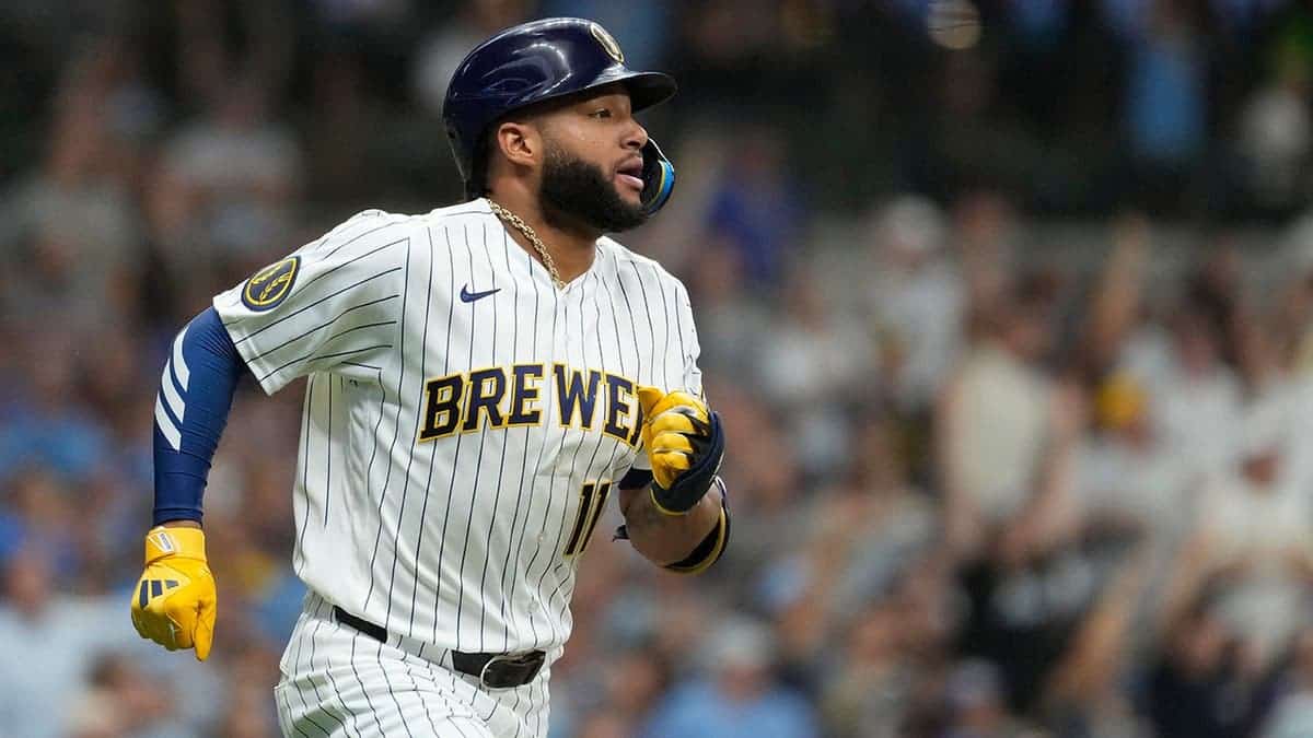 Jackson Chourio rounds the bases after hitting a solo home run.