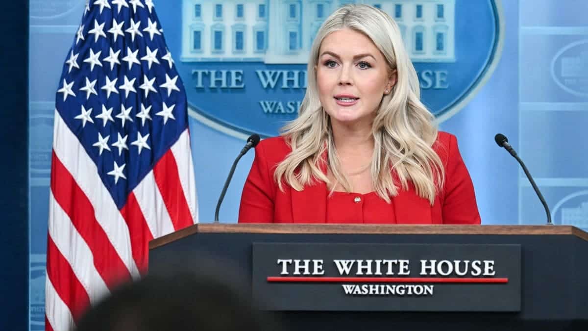 Karoline Leavitt at press room podium in White House