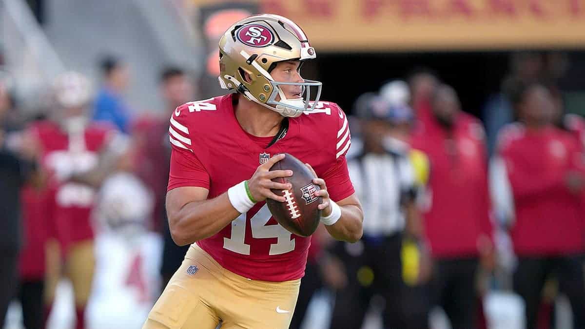 Kurtis Rourke rolls out looking to pass against the Tennessee Titans at Levi's Stadium.