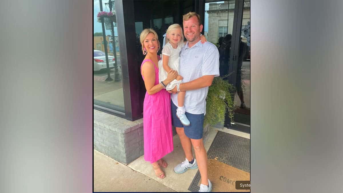 Lillian Smart, 8, pictured with her parents before her death from a rare brain infection