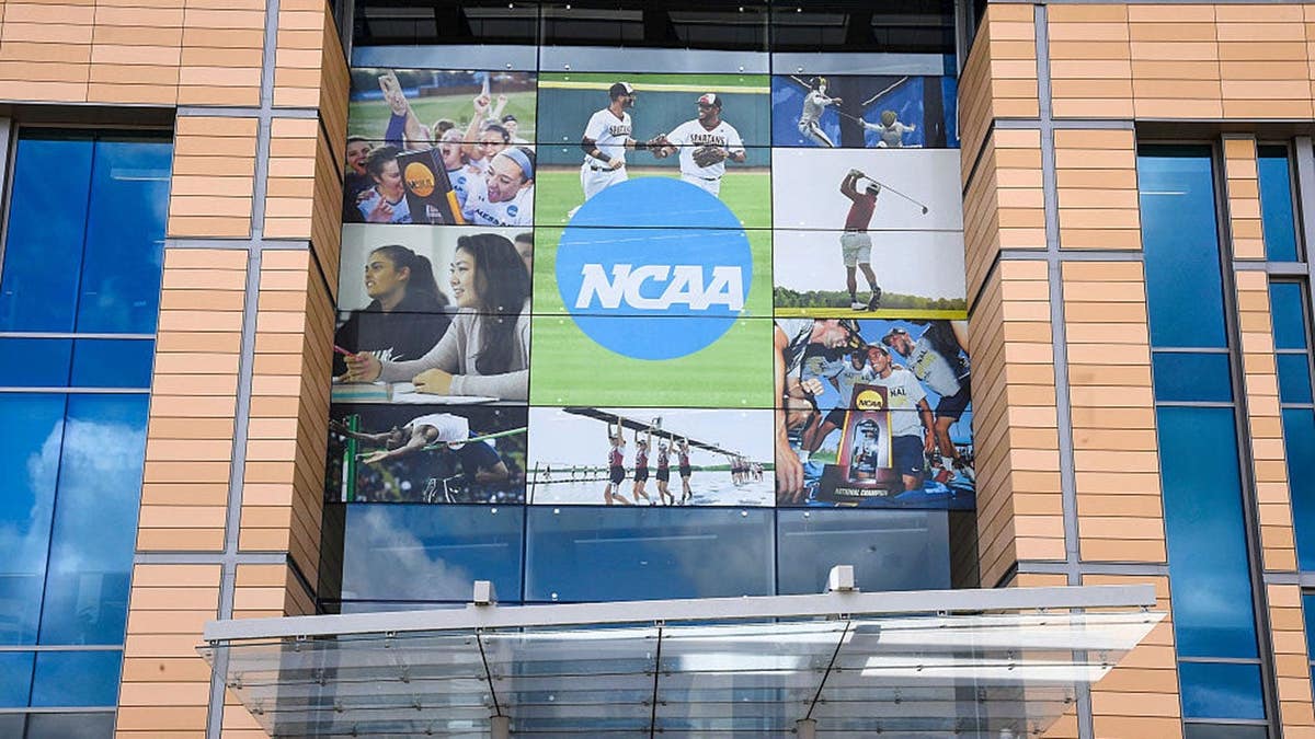 NCAA logo on the exterior of the National Collegiate Athletic Association building in Indianapolis.