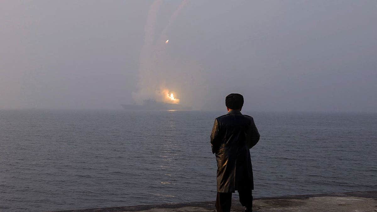 North Korean leader Kim Jong Un watches a cruise missile launch from the destroyer Choe Hyon in March 2026