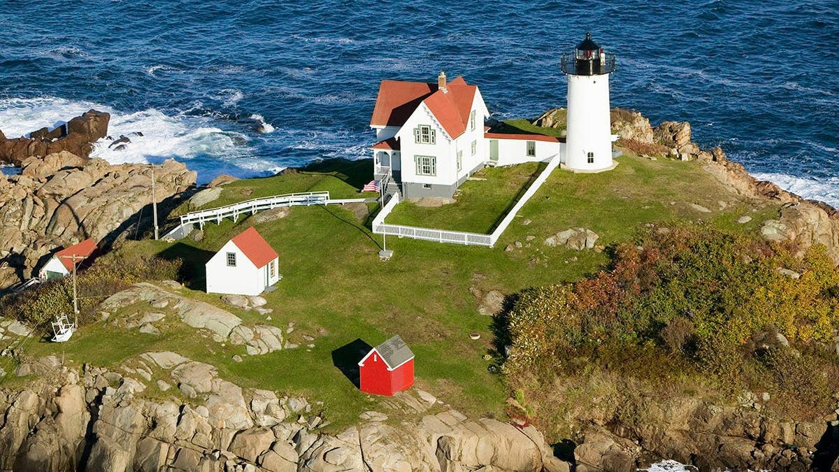 Nubble Lighthouse stands on the coast in Cape Neddick, Maine.