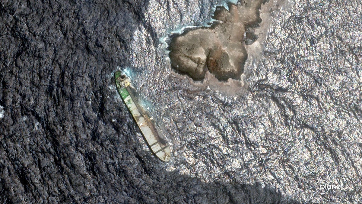 Satellite image shows crude oil spreading from grounded tanker Caroline Bezengi off Oman coast.