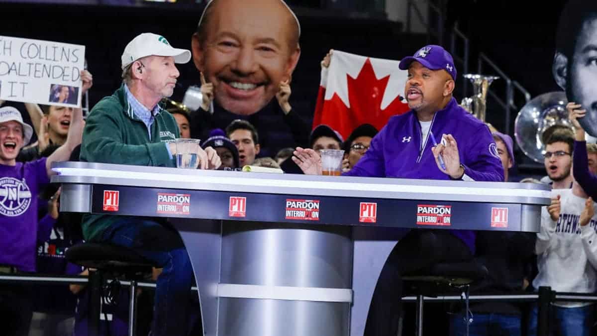Michael Wilbon and Tony Kornheiser sit during a taping at Welsh-Ryan Arena.