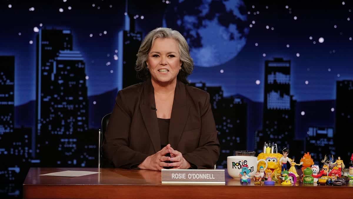 Rosie O'Donnell sits on the Jimmy Kimmel Live! stage.
