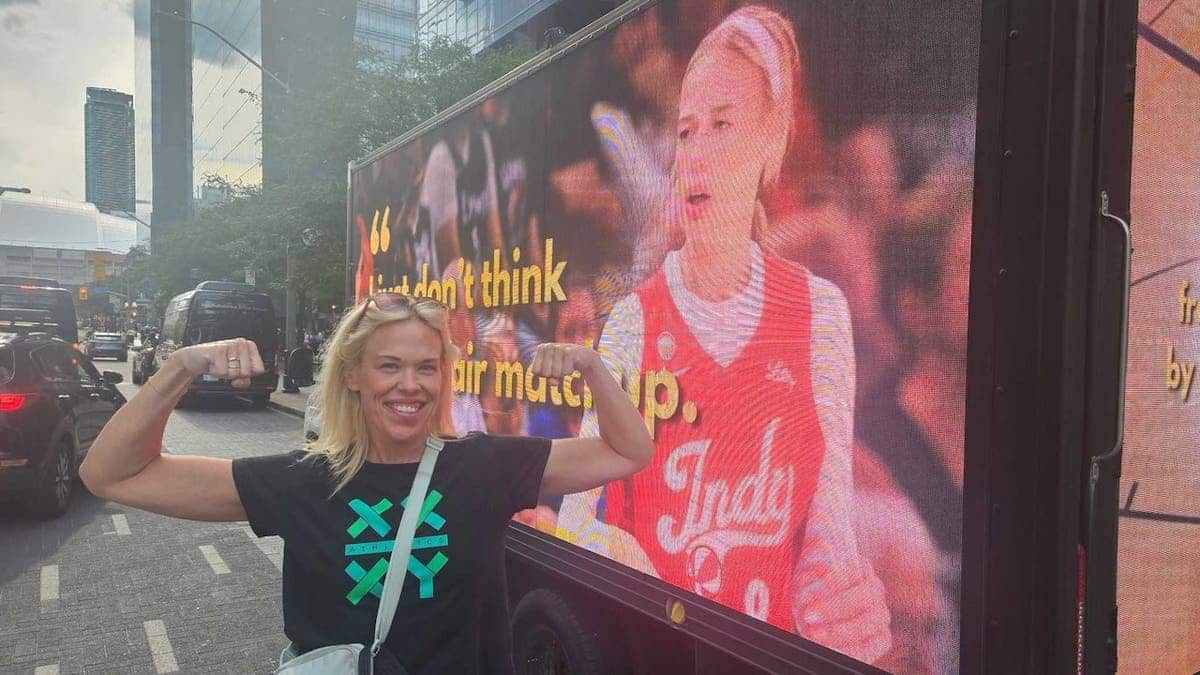 Canadian powerlifting champ April Hutchinson celebrates Sophie Cunningham in Toronto.