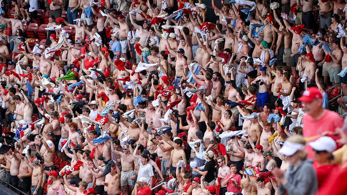 Shirtless St. Louis Cardinals fans celebrating at Busch Stadium