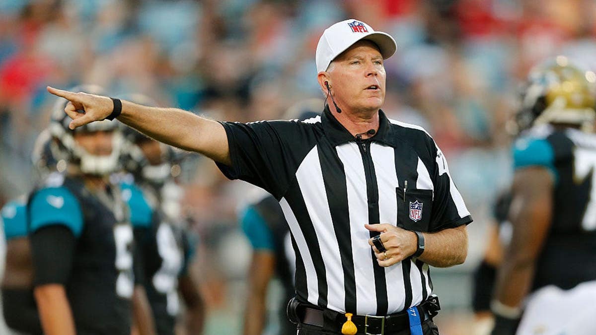 Referee Terry McAulay makes a call during a preseason game between the Jacksonville Jaguars and Tampa Bay Buccaneers.