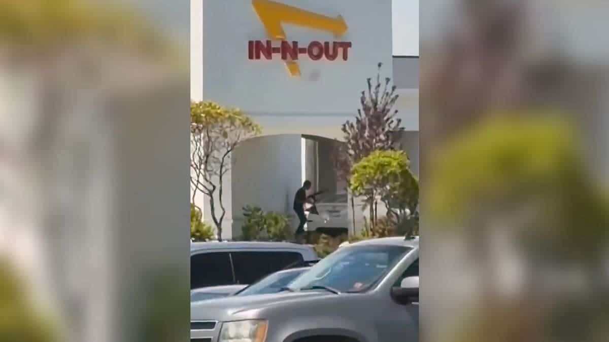 the scene of a shooting that started at an In-N-Out Burger restaurant