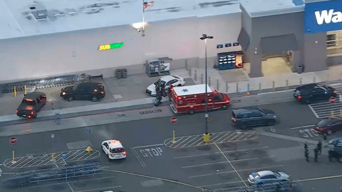 officers outside Walmart in Darby Township, Pa.