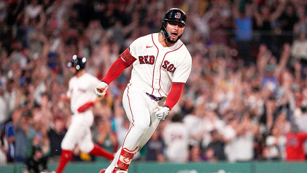 Wilyer Abreu celebrates tying the game at Fenway Park.