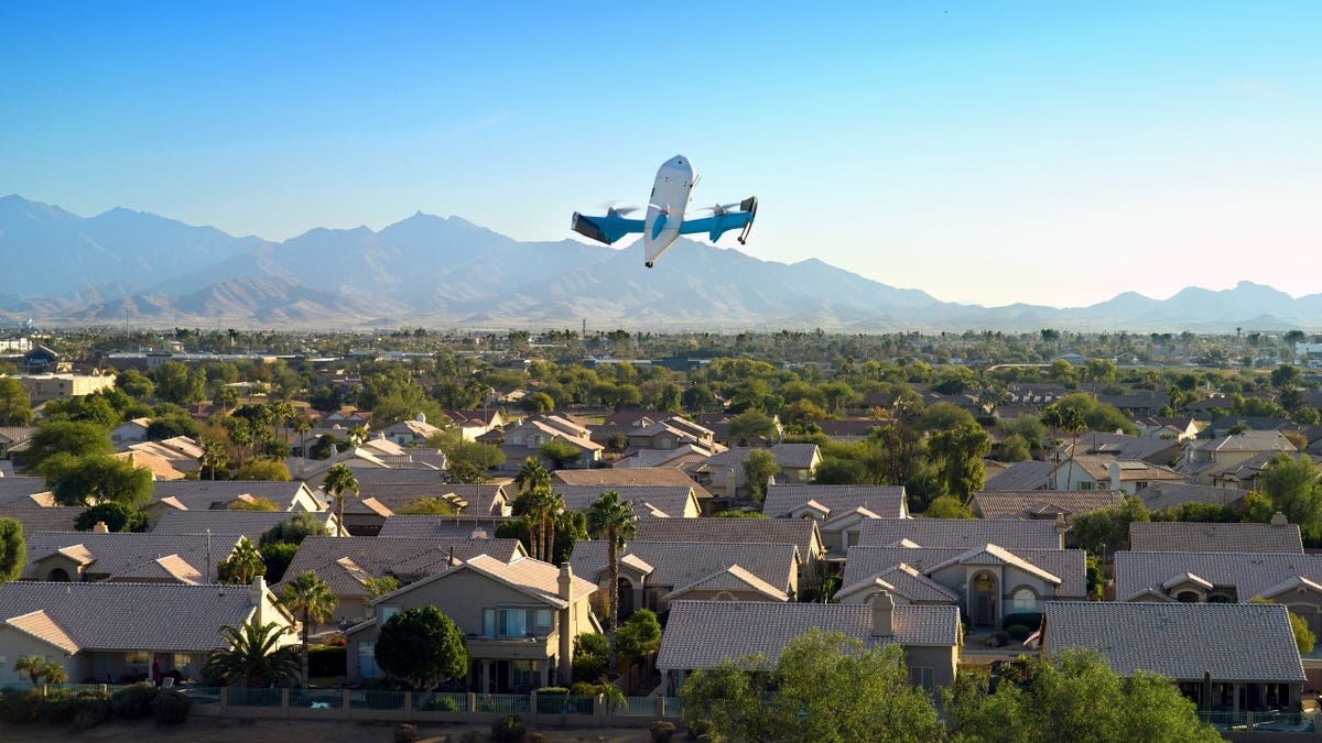 Amazon Prime Air drone flying above a neighborhood.