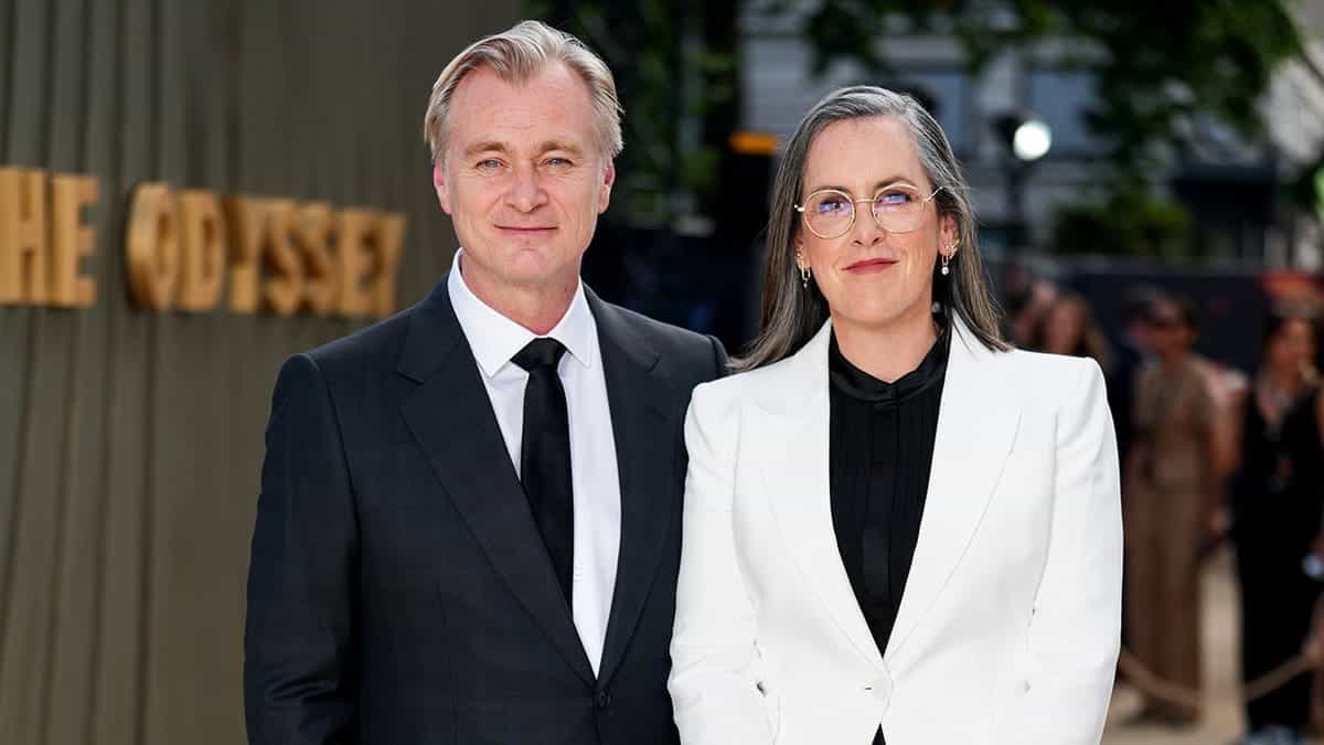 Christopher Nolan and Emma Thomas pose for photographers at The Odyssey world premiere in London.