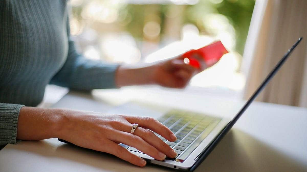 Woman making a payment on her laptop.