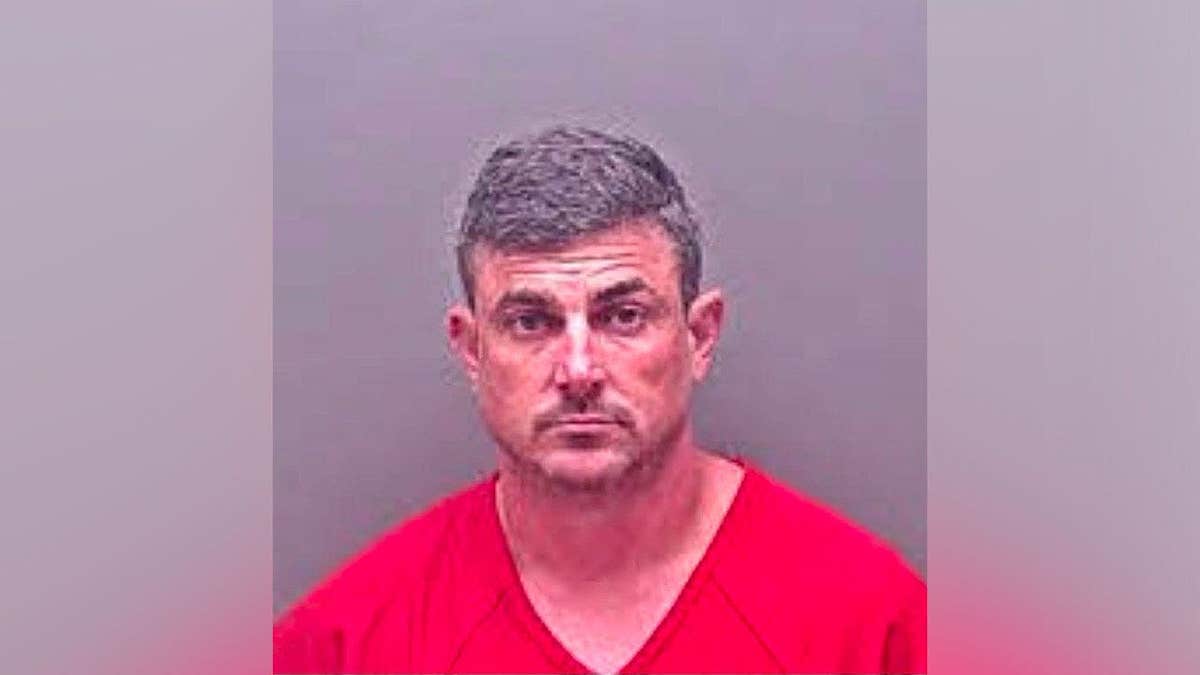 Booking photo of HSI Special Agent Kent Blacklidge after his Alabama indictment.