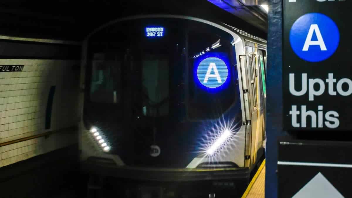 An A train arrives to a Subway station in Lower Manhattan
