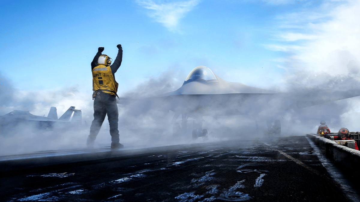 Artist’s rendering of a Boeing F/A-XX fighter on an aircraft carrier deck as a crew member signals nearby