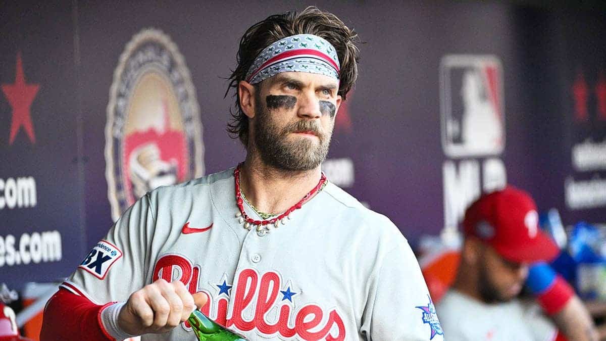Philadelphia Phillies first baseman Bryce Harper standing in the dugout at Nationals Park.