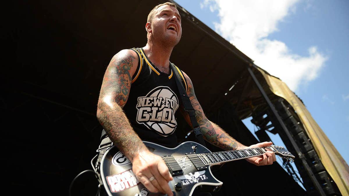 Chad Gilbert of New Found Glory performs onstage at Vans Warped Tour.