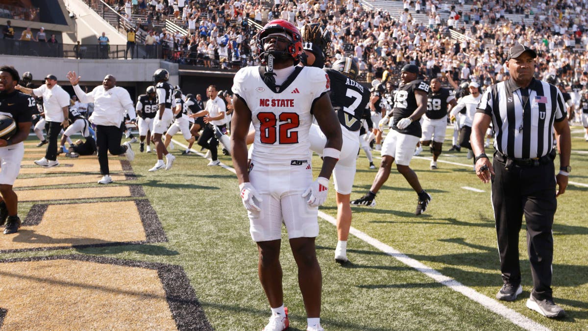 Chance Robinson reacts after NC State's loss to Vanderbilt at FirstBank Stadium.