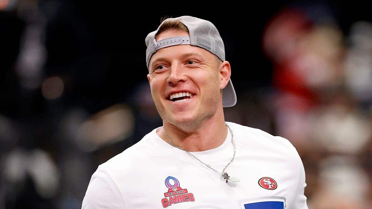 Christian McCaffrey smiles after scoring a touchdown during the Pro Bowl game in San Francisco.