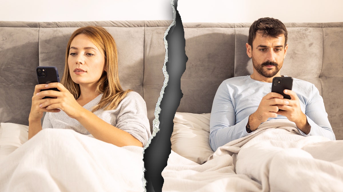 Couple on phones in bed