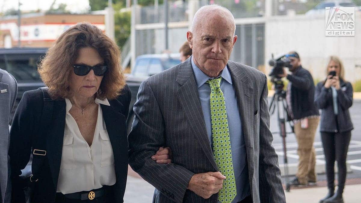 Rob and Kathy Kirk arrive at a Utah courthouse for a hearing in the murder case against Tyler Robinson.