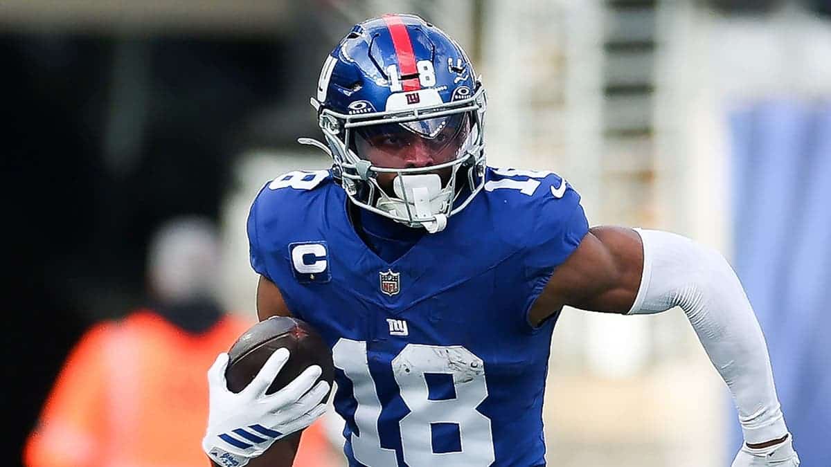 Darius Slayton #18 runs with the ball during a game at MetLife Stadium.