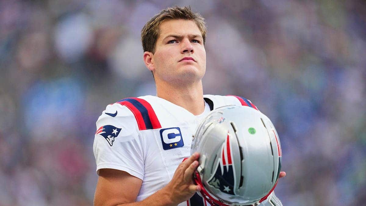 Drake Maye of the New England Patriots looks on during an NFL game against the Seattle Seahawks.