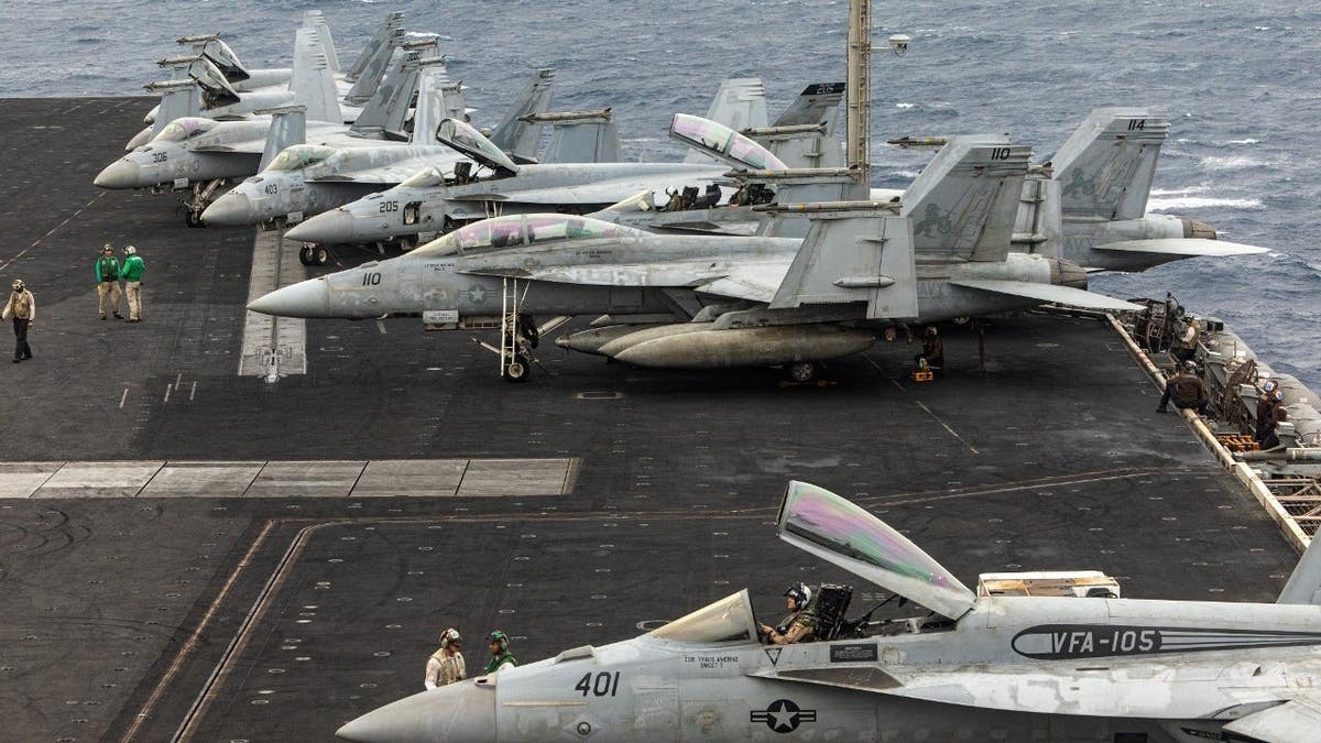 F/A-18 Super Hornet fighter jets on the flight deck the USS Dwight D. Eisenhower